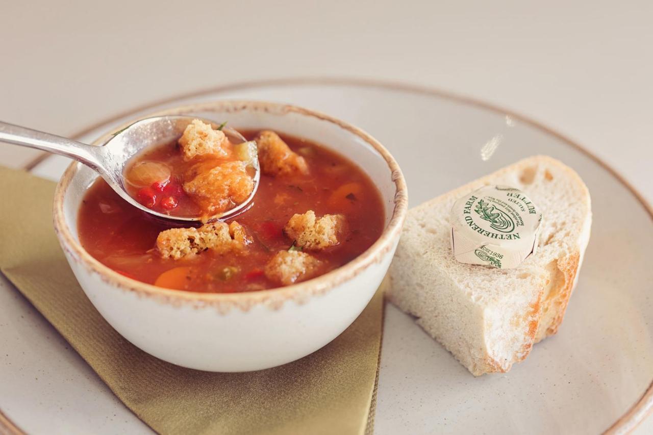 Longlands Inn & Cottages Carnforth Exterior photo A bowl of soup with a bread roll