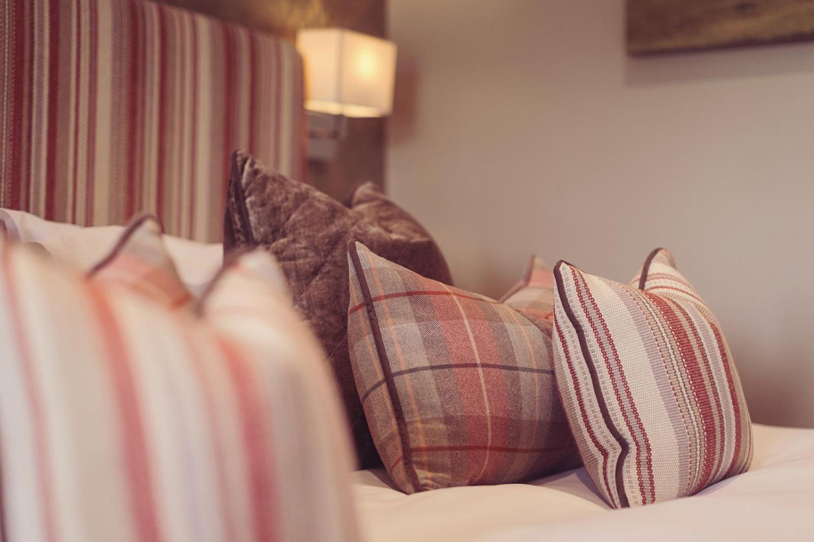 Longlands Inn & Cottages Carnforth Exterior photo Cushions on a bed