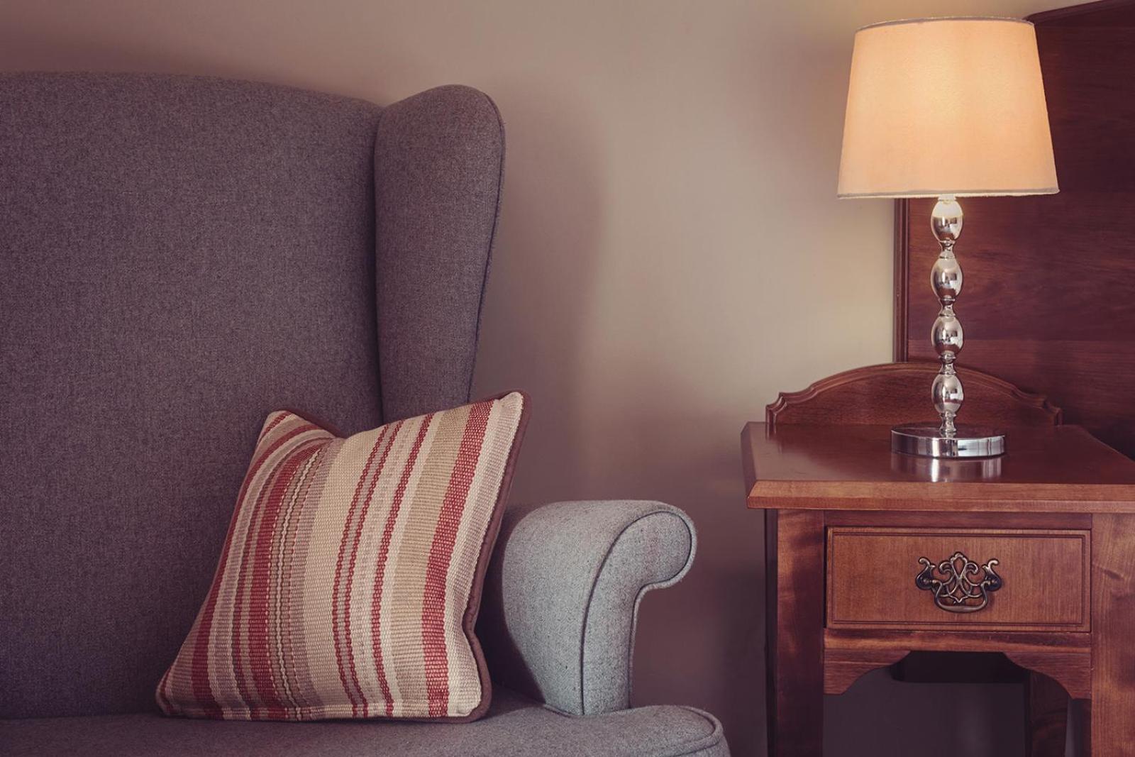 Longlands Inn & Cottages Carnforth Exterior photo A throw pillow on a sofa